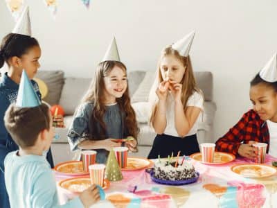 children-s-funny-birthday-party-decorated-room-happy-kids-with-cake-ballons